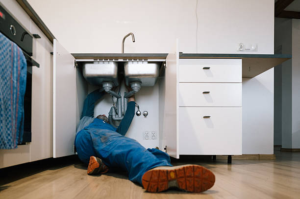 Professional Drain Cleaning technician working in Waco, NC